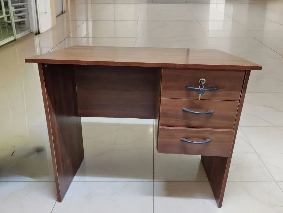 Brown Secretaryâ€™s office desk 3 drawer